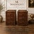 Bring timeless British-inspired luxury into your bedroom with this handcrafted leather trunk-style nightstand pair....