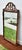 Antique (1920's) Wall Mirror has a Chippendale Style. Made of Wood. Mahogany. Carved Wood. Intricate Fretwork at the Top...