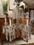 A stunning vintage crystal and blown glass chandelier in the style of Baccarat. The light features six lights and has no...