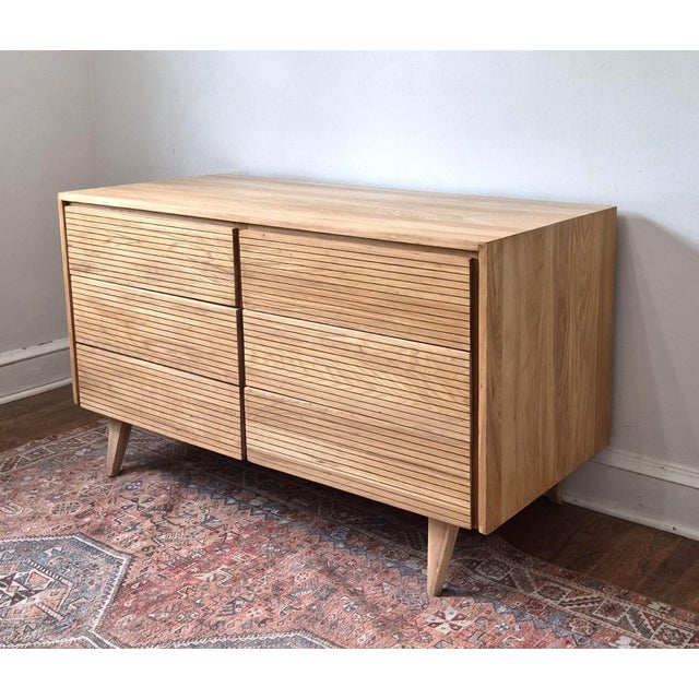 Stunning solid wood vintage double-sided room divider. One side features 4 drawers and a cabinet, while the other has open...