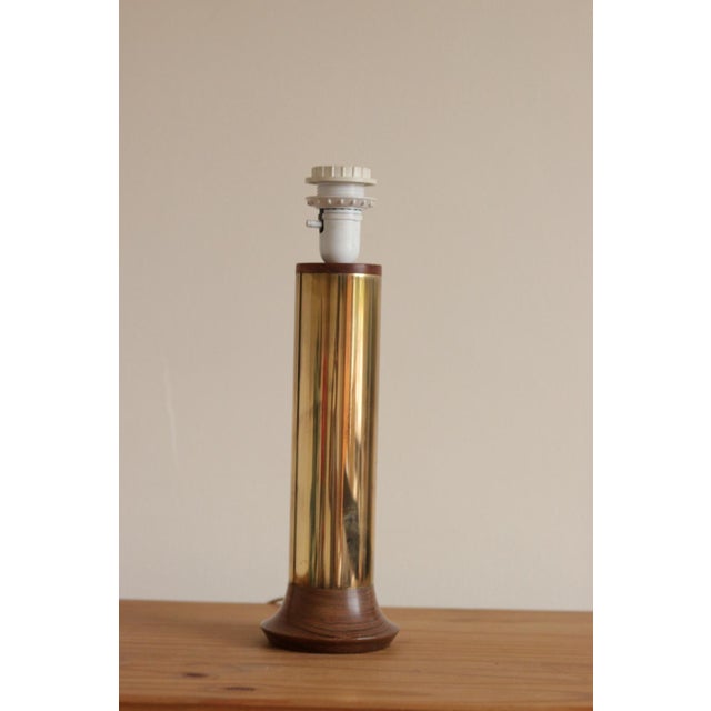 Made in Sweden. Vintage Large Brass Table Lamp This stunning brass table lamp exudes a sense of luxury with its timeless...