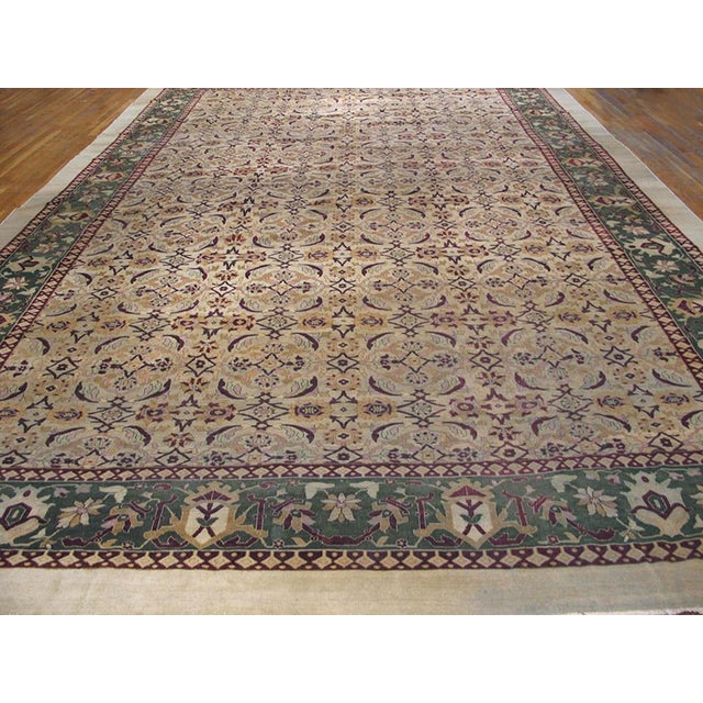19th Century N. Indian Amritsar Carpet The perfectly balanced herati pattern of rosettes and curved leaves neatly fills...