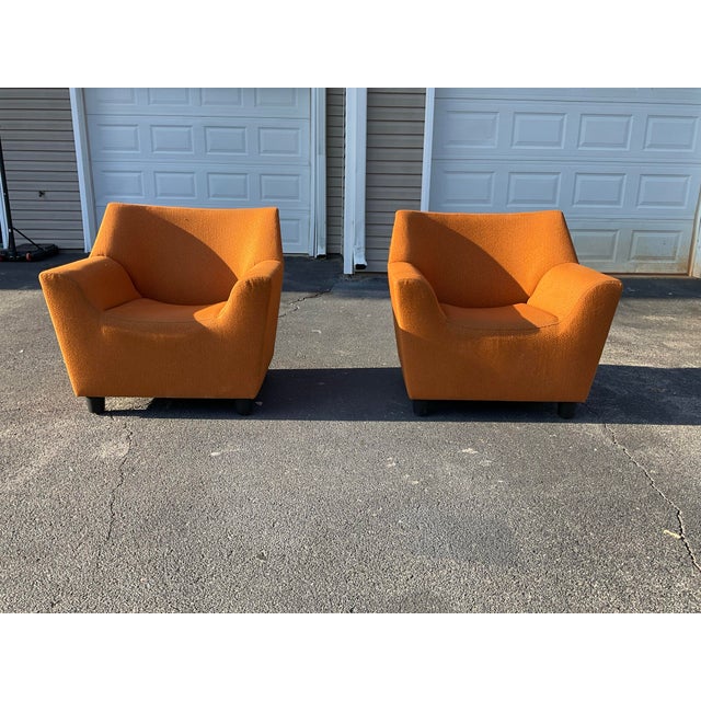 Elevate any modern living space or design project with this striking pair of Herman Miller Geiger Swoop Club Chairs...
