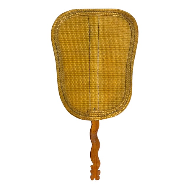 Vintage Woven Rattan Hand Fan With Carved Wooden Handle For Sale