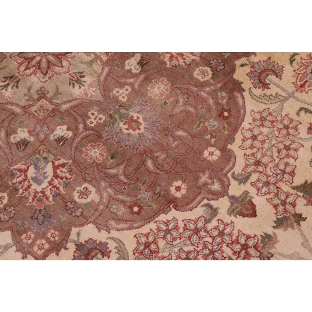 Designed with mesmerizing intricacy and gorgeous color palette, this hand-knotted masterpiece demonstrates the beauty and...