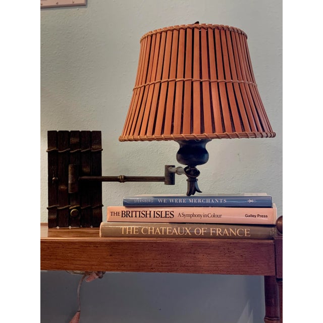 What a find! Rustic Bronze Swing Arm Wall Lamp that can be hard-wired or plugged into an outlet (solid cord covers...