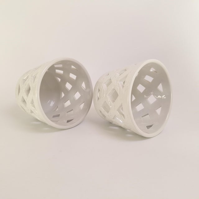 Beautiful pair of planters designed by Gunnar Nylund for Rörstrand, Sweden in the 1950s. Crafted from white glazed...