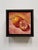 This oil on board piece features a striking composition of two oranges alongside a scorpion, all rendered in a rich...