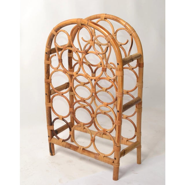 Vintage Tiki bar Arched burnt bamboo, cane and rattan twelve bottle wine rack, wine storage, wine basket. The basket is...