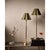 The Polly Buffet Table Lamp showcases sophistication with its single scalloped shade, casting a warm and inviting glow...