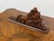 Design Plus Gallery presents a Dragon Sculpture Carved from Wood. The Dragon is mounted on a display piece to stand...