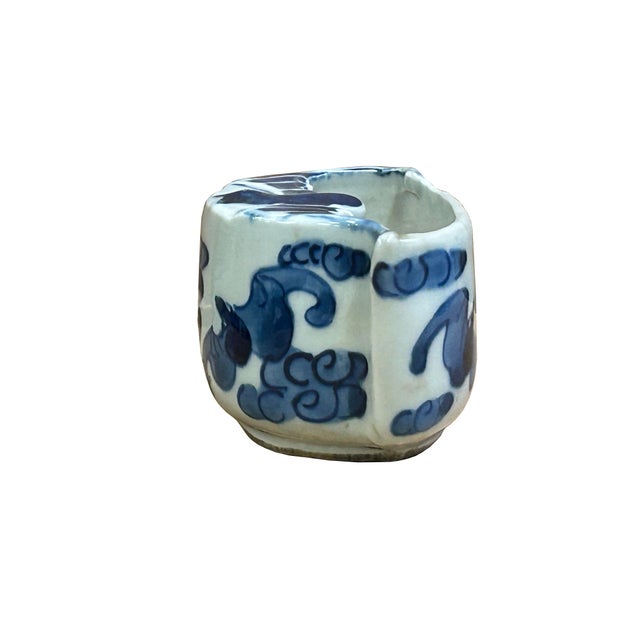 This exquisite antique blue and white porcelain water dropper is masterfully hand-painted with traditional motifs...