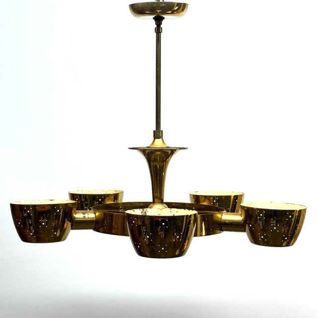 MidCentury Brass Lightolier Fixture by Gerald Thurston. Light is diffused by round frosted glass discs and pierced brass...