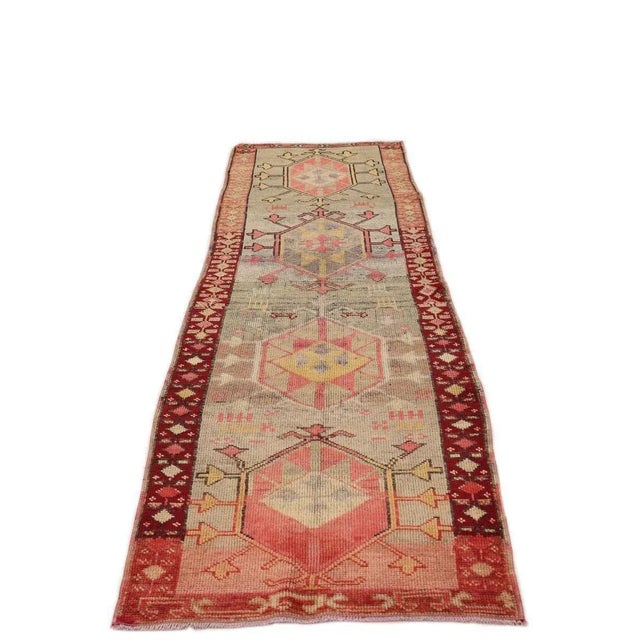 Handknotted vintage decorative Herki runner from Northern Iraq. Approximately 50-60 years old. In very good condition.