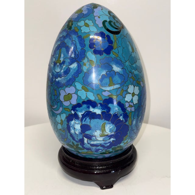 Cloisonné egg is brightly colored enamel with flower and butterfly motif. Combine chinoiserie and Easter with this elegant...