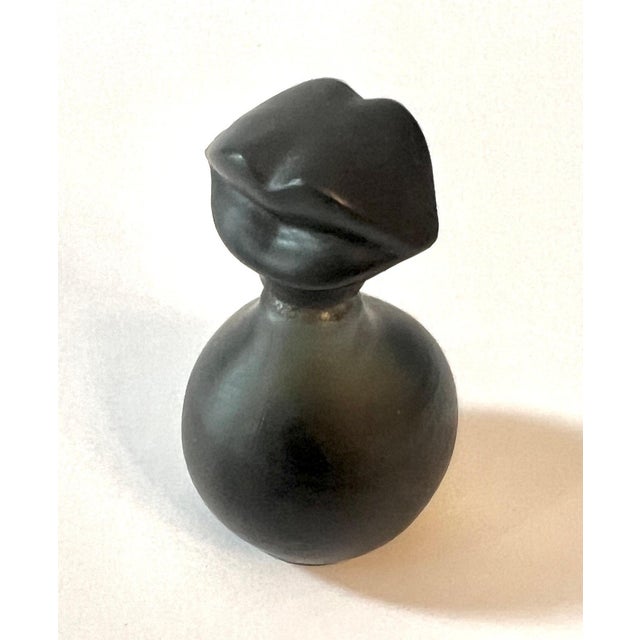 Salvador Dali, one of the world's most important artists, designed this beautiful small perfume bottle. Currently there is...