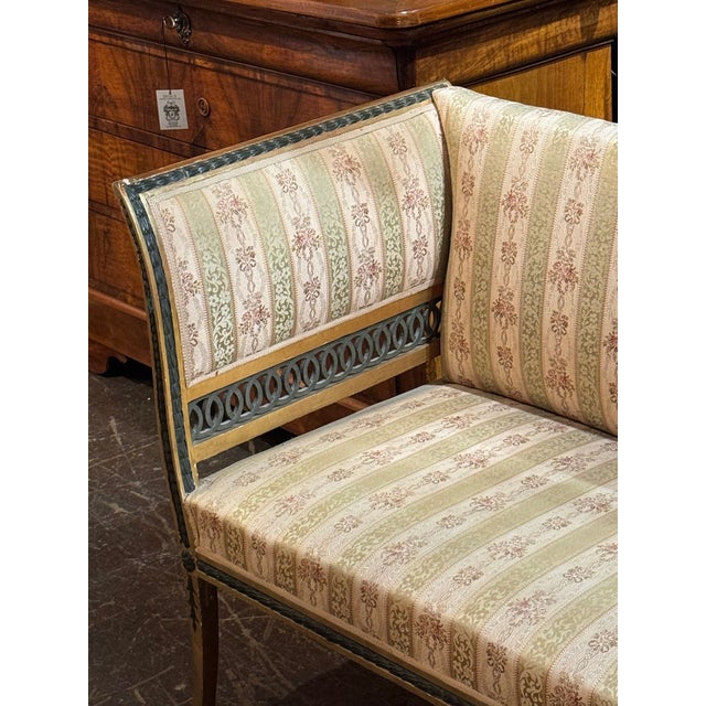 The 19th Swedish Gustavian settee is an antique piece of furniture that exudes a timeless charm and elegance. With its...