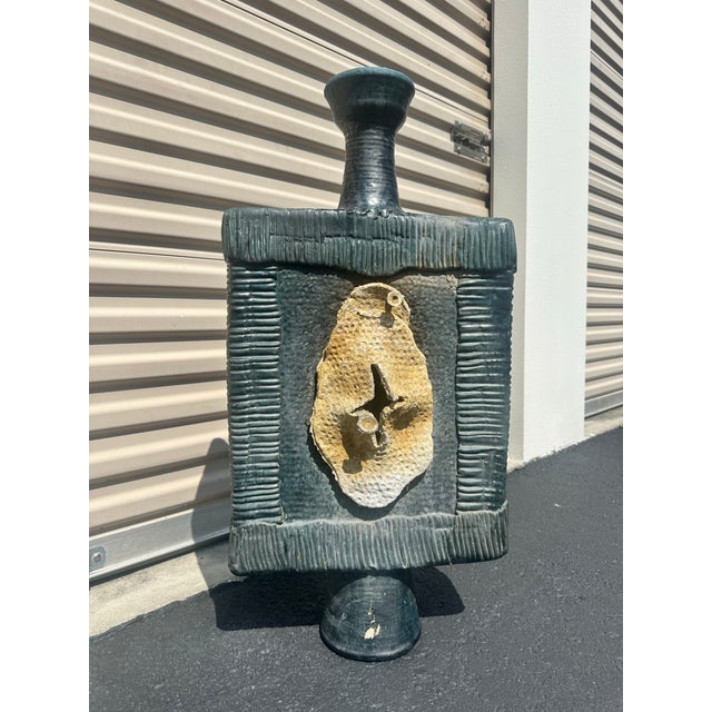 Oversized painted cement/ceramic and fossilized coral sculpture in the manner of Troika. Very heavy but hollow with no...