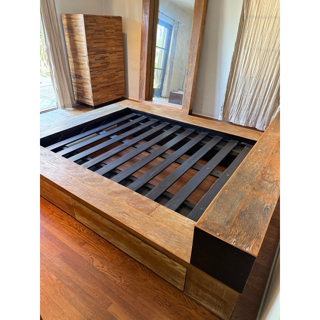 Environment Furniture Queen size bed with 4 drawers underneath. Reclaimed wood- rail road ties I believe and this is a...