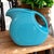 Excellent condition late 20th century Fiesta-ware disc water pitcher in beautiful turquoise. Dimensions 7” tall x 7.5”...