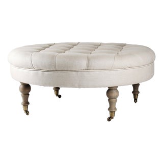 Maison Tufted Round Ottoman in Linen with Natural Oak Turned Legs For Sale