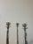 A sculptural mid century modern three-light candelabra designed and signed by Castor Cooper. Cast in pewter with an...