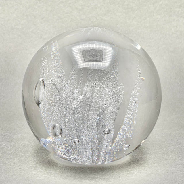 • This stunning crystal paperweight was designed by Vicke Lindstrand for Kosta Sweden as part of the celebrated Mykene...