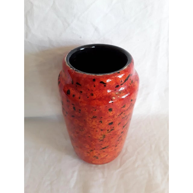 Vintage Orange Ceramic 231/15 Vase from Scheurich, in Very Good conditions. Designed 1960 to 1969 This piece has an...