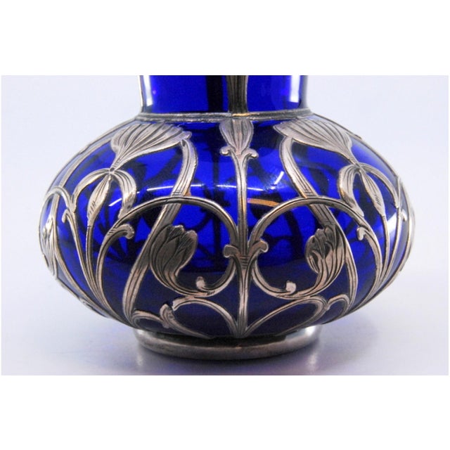 Blue Glass Jar with Islamic Style Silver Cut, in Good conditions. Designed 1920 to 1949