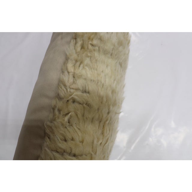 Pillow made from a furry turkish tulu vintage rug