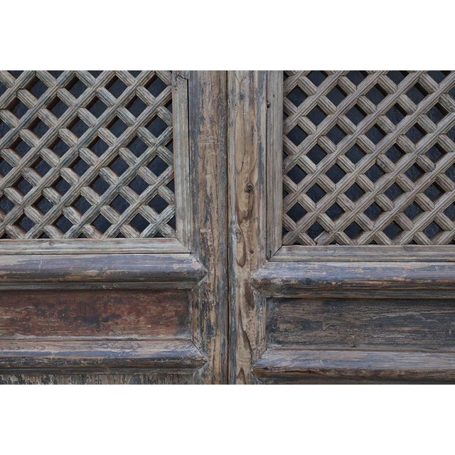 Pair of Antique Chinese Pine Trellis-top Wall Panels/Doors/Screen, originally designed as room paneling with deep...