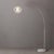 The Float Arc Lamp is a sophisticated lighting fixture with a satin nickel steel body and a sphere white satin steel...
