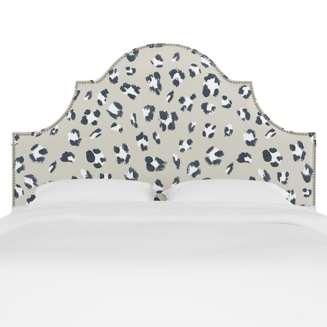 Classic curves wrapped in smooth upholstery, then accented with elegant ornamental nailheads, gives this Upholstered...