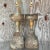 A striking pair of vintage Boho wood lamps. Chic turned wood with a weathered finish. Hand painted hardware really adds to...