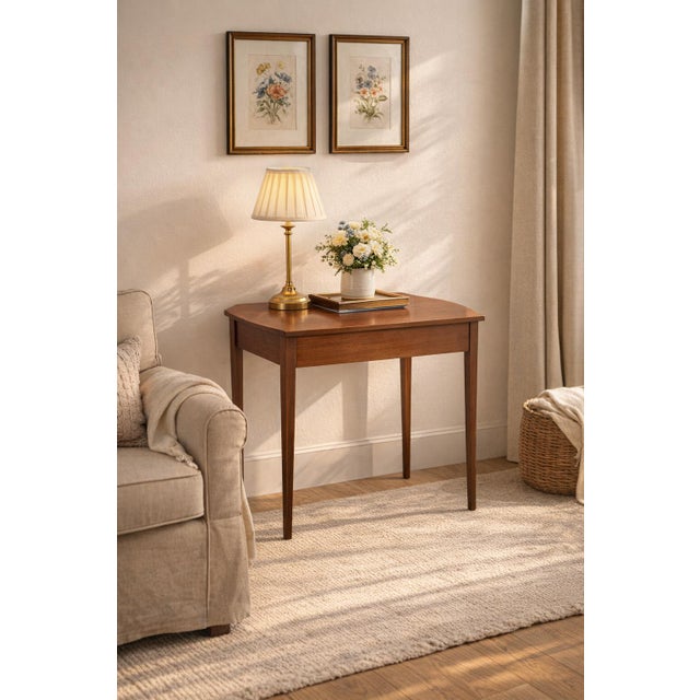 A splendid Mid-Century Modern side table dating back to the 1960s. This piece stands out for its elegant and dynamic...