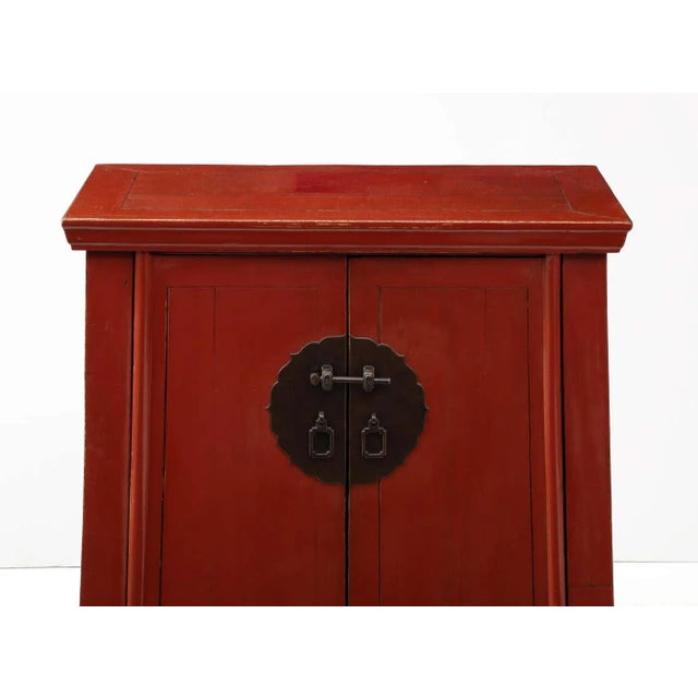 Great looking 19th-century cabinets in a striking red lacquer finish. Decorated with original bronze hardware, the...