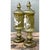 This pair of vintage glass apothecary jars combines a traditional lidded form with lively hand-painted decoration. Figures...