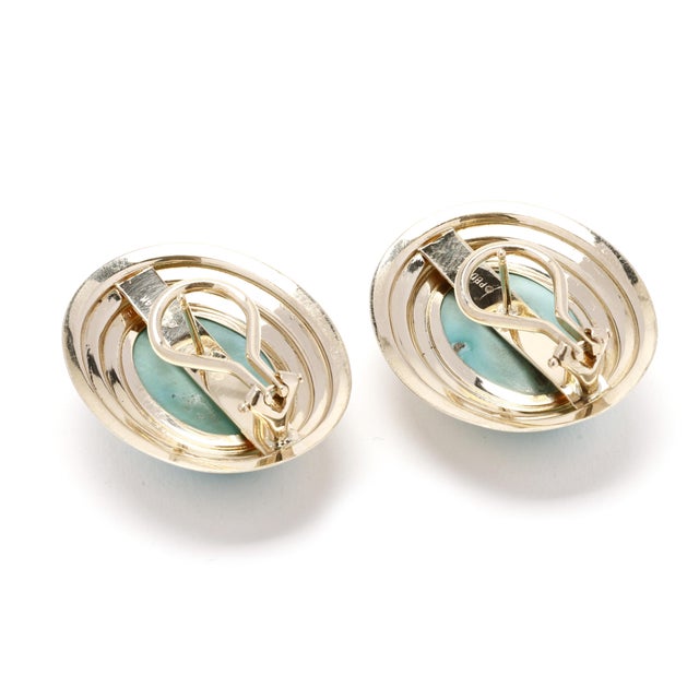 Stones: - turquoise, 2 stones - oval cab - 18 x 12.5 mm Length: 1 in. Width: 7/8 in. Weight: 7.3 dwts/ 1.3 grams Stamps:...