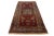 This handcrafted Kazak wool rug features a vibrant red palette with delicate green, blue, and beige accents. The center of...