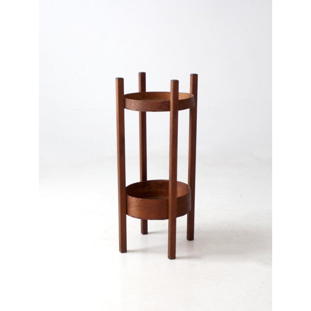 Antique primitive two-tier shelf crafted from round cheese boxes at the turn of the century. The base functions as the...