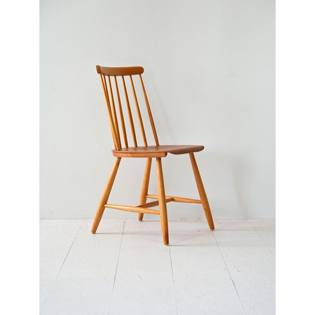 Pinnstol' chair produced in Sweden in the 1960s, with teak wood seat and beech structure. Simple and linear design,...