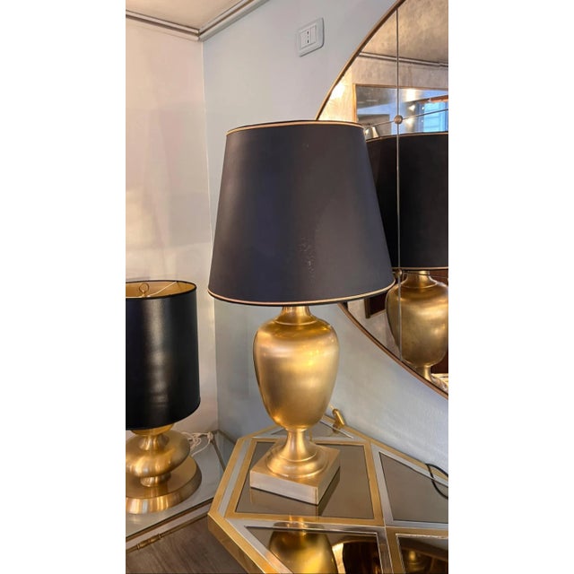 Gilt brass table lamp with black shade, 1970s Diameter 35 cm, height with lampshade 74 cm. European Plug (up to 250V).The...