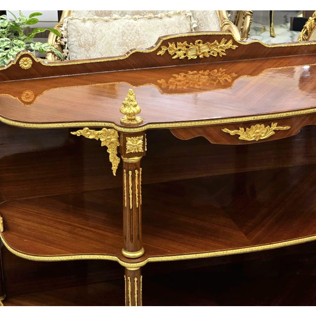 Enhance your home with the timeless elegance of this handcrafted French-style open console table. Expertly crafted from...