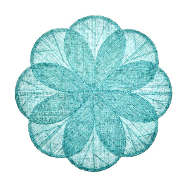 A bestseller made of woven abaca fibers, cut and sewn into a sheer floral mat. Great for layering and making a happy...