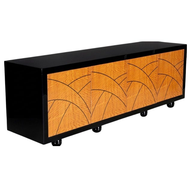A striking and architectural “Boca” credenza by Pace Collection, showcasing the brand’s signature mastery of bold geometry...