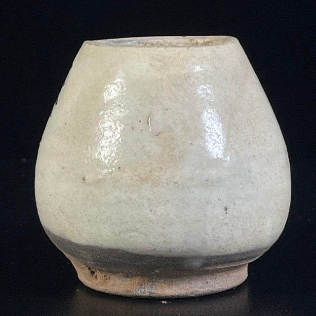 This is a charming vintage folk pottery jar, likely a traditional bird feeder or small vessel, crafted from earthenware...