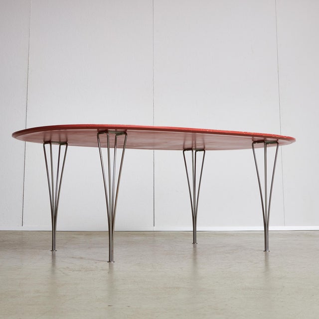 The Table Series by Fritz Hansen includes the Superellipse table, a design collaboration between Piet Hein, Bruno...
