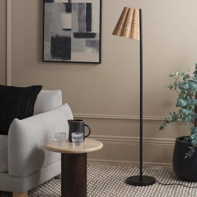 Illuminate your space with the Mio Floor Lamp, a stylish and functional piece designed to complement any room. This lamp...