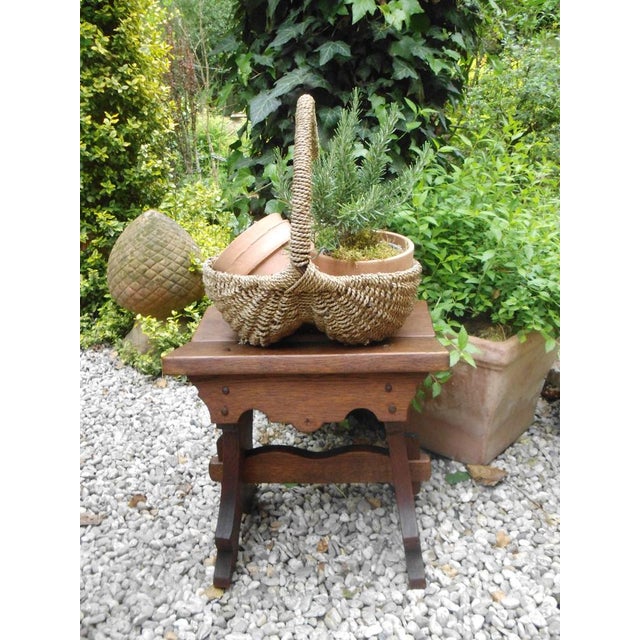 Antique wooden stools made of solid oak in an unusual shape, very decorative. I have freshly oiled the wood.