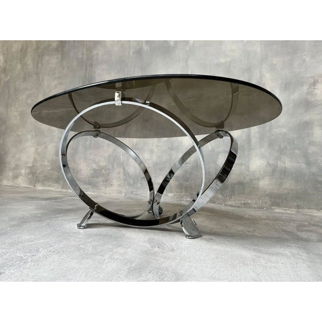 Beautiful Mid-Century coffee table attributed to Knut Hesterberg. 60s design, with a thick glass fumed table top....